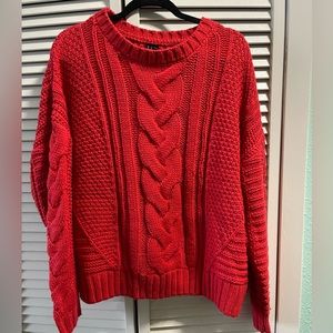 Red cable knit sweater